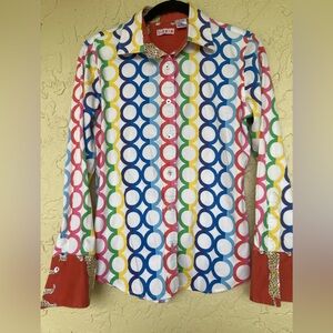 Tizzie Top with geometric circular patterns with hints of animal print